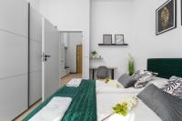 Posteľ alebo postele v izbe v ubytovaní Exclusive Apartment Kajdasza Wroclaw by Noclegi Renters