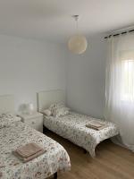 Postel nebo postele na pokoji v ubytování Villa Marta