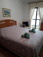 Posteľ alebo postele v izbe v ubytovaní Playa Marina Phase II