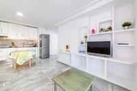 Kuchyň nebo kuchyňský kout v ubytování Apartamento Faro 2
