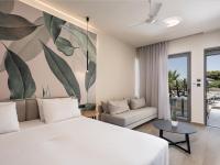 Postel nebo postele na pokoji v ubytování Mossa Well Being Hotel