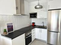 Kuchyň nebo kuchyňský kout v ubytování Residencial Luxury Senator, Apartamento Darwin