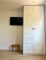 TV a/nebo společenská místnost v ubytování Grup D'Aro Apartment