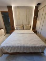 Posteľ alebo postele v izbe v ubytovaní Adell Miramare Golden Loft