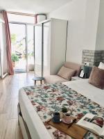 Postel nebo postele na pokoji v ubytování Apartamentos Élite - Art Collection - Frida