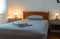 Postel nebo postele na pokoji v ubytování Lafkos House, Pelion
