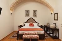 Postel nebo postele na pokoji v ubytování Nobili Boutique Hotel