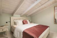 Postel nebo postele na pokoji v ubytování Nobili Boutique Hotel
