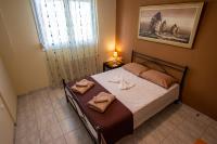 Postel nebo postele na pokoji v ubytování Kaliva House