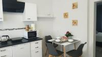 Kuchyňa alebo kuchynka v ubytovaní Apartamenty gościnne na szlaku