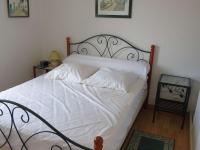 Posteľ alebo postele v izbe v ubytovaní Appartement lumineux à 2 pas de la plage, balcon, ascenseur, TV, lave-linge, animaux admis - FR-1-674-19