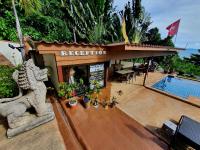 an aerial view of a restaurant with a pool at Moonstone Studio in Haad Rin