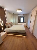 Posteľ alebo postele v izbe v ubytovaní Adell Miramare Golden Loft