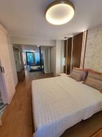 Posteľ alebo postele v izbe v ubytovaní Adell Miramare Golden Loft