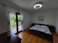 Postel nebo postele na pokoji v ubytování Seafront House Nusha