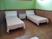 Postel nebo postele na pokoji v ubytování A CONDA-habitación privada