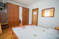 Postel nebo postele na pokoji v ubytování Apartments Nataša