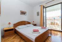 Postel nebo postele na pokoji v ubytování Apartments Nataša