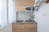 Kuchyň nebo kuchyňský kout v ubytování Apartments Nataša
