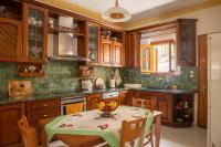 Kuchyňa alebo kuchynka v ubytovaní Violetta's House Παραδοσιακή Βίλα στην Πορταριά