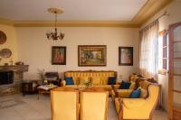 Posedenie v ubytovaní Violetta's House Παραδοσιακή Βίλα στην Πορταριά