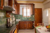 Kuchyňa alebo kuchynka v ubytovaní Violetta's House Παραδοσιακή Βίλα στην Πορταριά