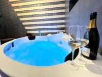 Napoje w obiekcie Gîte cosy avec Jacuzzi classé 3 étoiles