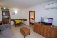 Televízia a/alebo spoločenská miestnosť v ubytovaní Apartment Punta A2 - max. 4 Person