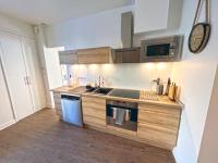 Kuchnia lub aneks kuchenny w obiekcie Gîte cosy avec Jacuzzi classé 3 étoiles