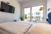 Posteľ alebo postele v izbe v ubytovaní VacationClub - Let’s Sea Baltic Park C79