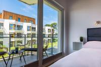 Posteľ alebo postele v izbe v ubytovaní VacationClub - Let’s Sea Baltic Park C79