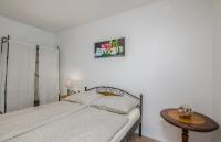 Postel nebo postele na pokoji v ubytování Apartment Tulipan