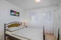 Postel nebo postele na pokoji v ubytování Apartment Tulipan