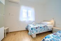 Posteľ alebo postele v izbe v ubytovaní Apartman Placa