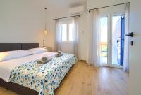 Posteľ alebo postele v izbe v ubytovaní Apartman Placa