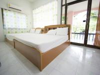 Postel nebo postele na pokoji v ubytování Chaiwat Resort