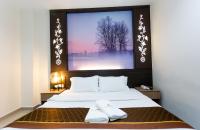 D&F BOUTIQUE HOTEL ERA SQUARE SEREMBANにあるベッド