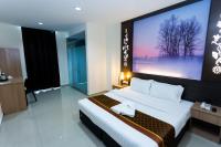 D&F BOUTIQUE HOTEL ERA SQUARE SEREMBANにあるベッド