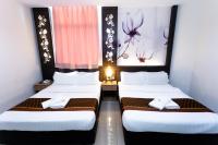 D&F BOUTIQUE HOTEL ERA SQUARE SEREMBANにあるベッド