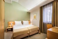 Ein Bett oder Betten in einem Zimmer der Unterkunft Maistra Select Petalon Resort