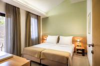Ein Bett oder Betten in einem Zimmer der Unterkunft Maistra Select Petalon Resort