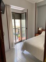 Postel nebo postele na pokoji v ubytování Hotel Venezuela
