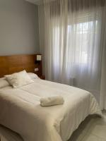 Postel nebo postele na pokoji v ubytování Hotel Venezuela