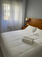Postel nebo postele na pokoji v ubytování Hotel Venezuela