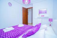 A bed or beds in a room at 075 Altos Magic House - Alicante Holiday