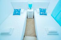 A bed or beds in a room at 075 Altos Magic House - Alicante Holiday