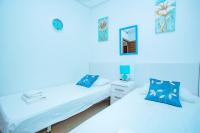 A bed or beds in a room at 075 Altos Magic House - Alicante Holiday