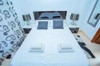 A bed or beds in a room at 075 Altos Magic House - Alicante Holiday