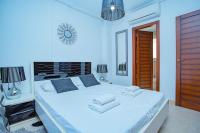 A bed or beds in a room at 075 Altos Magic House - Alicante Holiday