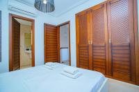 A bed or beds in a room at 075 Altos Magic House - Alicante Holiday